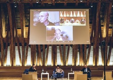 CAIML co-head Stefan Woltran, panelists Paul Timmers (remote), James Larus (remote), Helga Nowotny, and Gerhard Friedrich (seated) — Picture: Amélie Chapalain / TU Wien Informatics